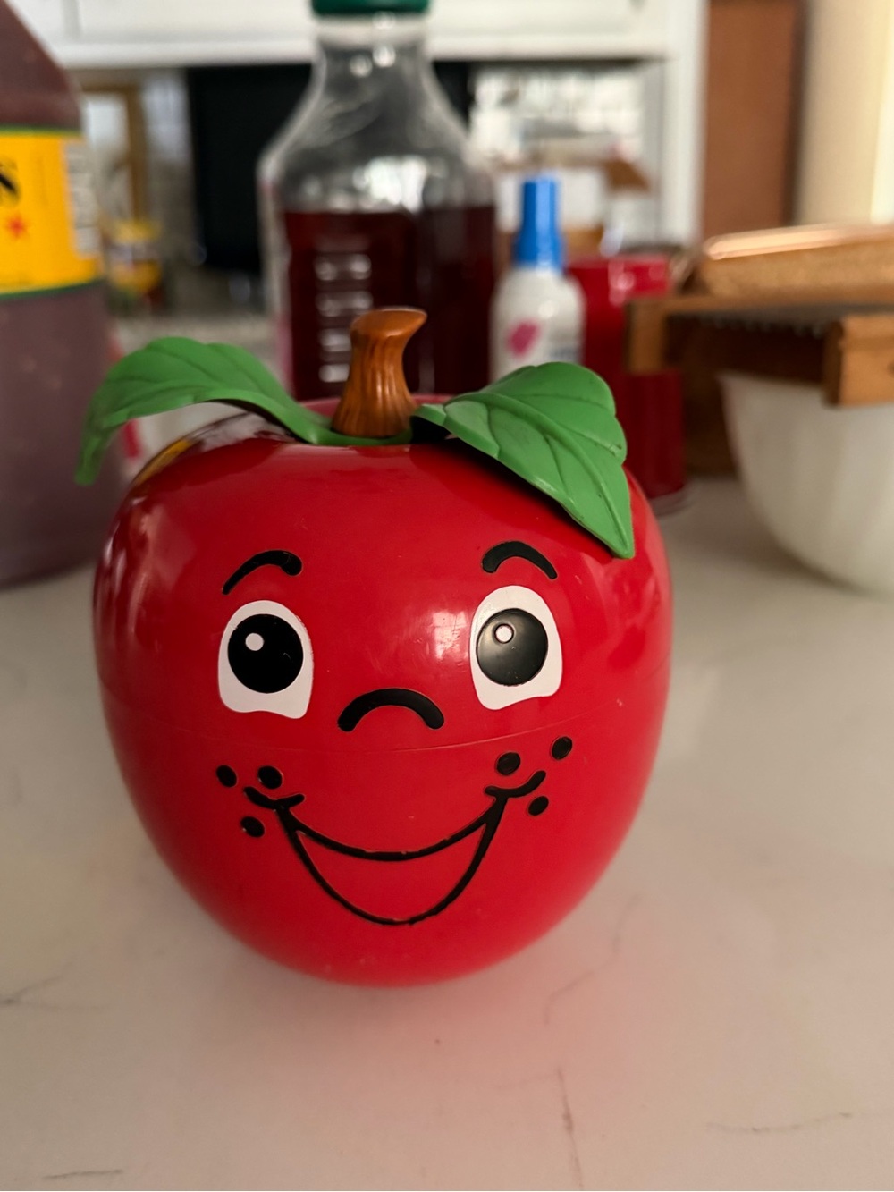 Fisher-Price Red Apple Character Toy with Green Leaves